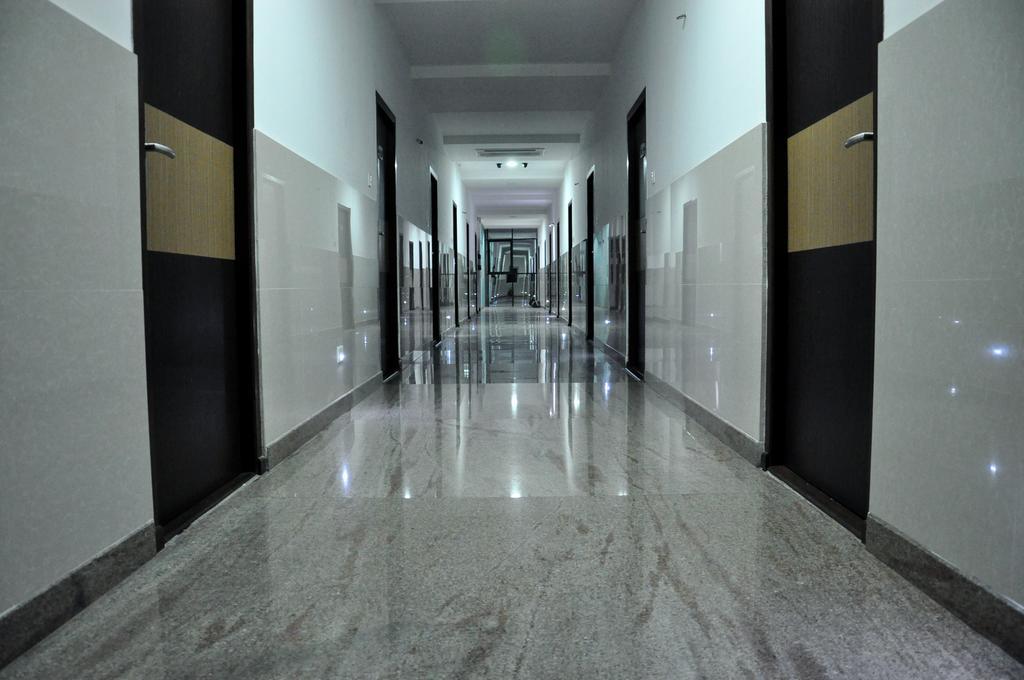 Hotel The Home Tirupur Szoba fotó